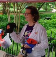 Baltimore Metropolitan Council Rideshare Coordinator Lillian Bunton greeted participants at the Towson Pit Stop with Bike to Work swag.