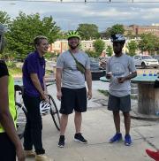 Baltimore Mayor Brandon Scott kicked off his ride to work after a safety briefing from Baltimore City Department of Transportation staff at a Pit Stop in Waverly.